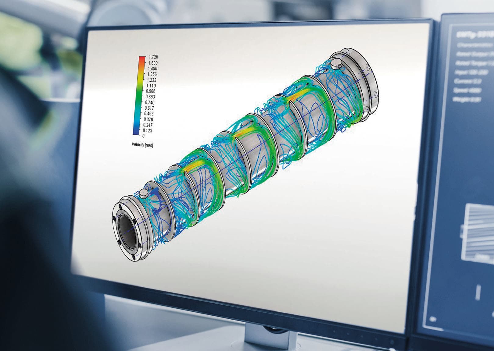 Monitor showing a colour simulation of a threaded cylindrical component