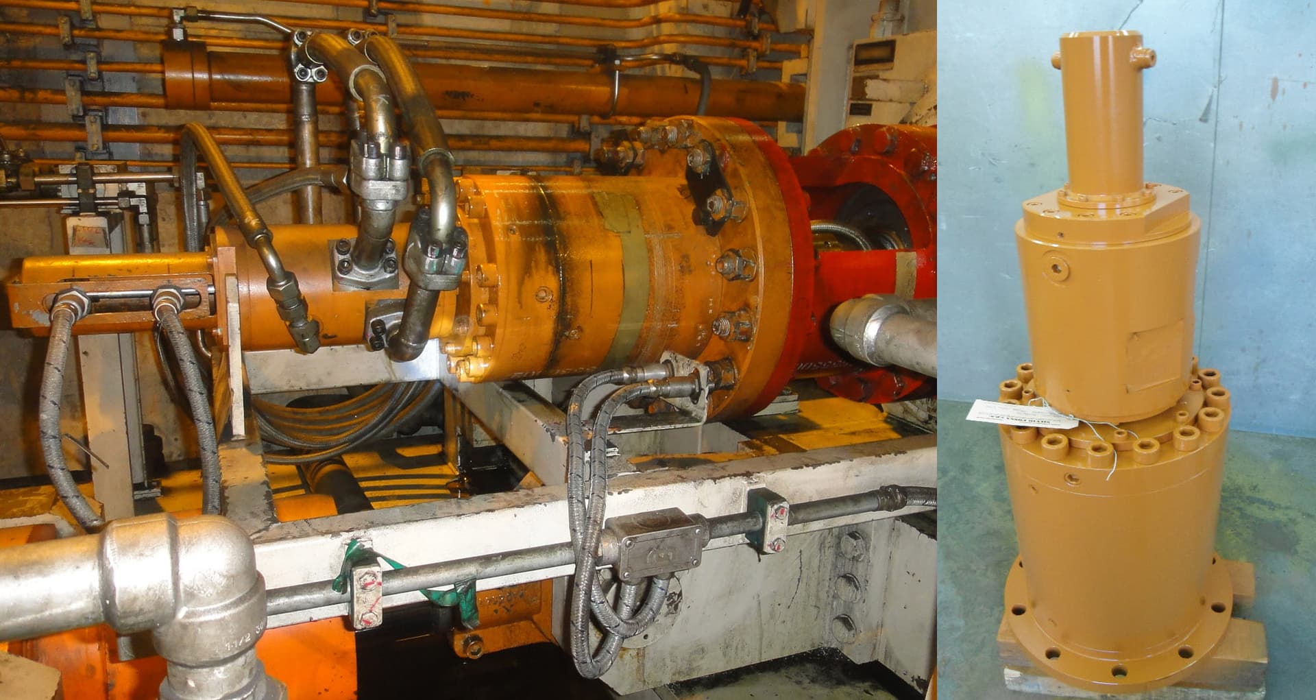 Vérin hydraulique jaune-orange monté sur une machine avec des flexibles